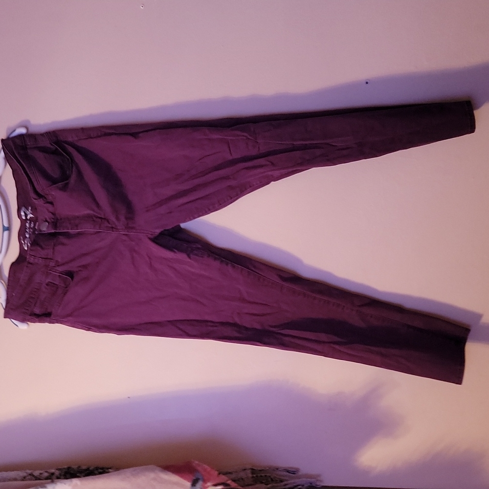 Pair of maroon jeans